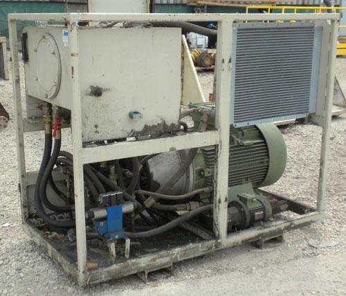 Used Holzmag Single Roll Shredder. Material of construction is carbon steel. 23.4” (600 mm) diameter x 66” (1690 mm) straight side roll with interchangeable knives. Hydraulic ram. Screen with 1.17” x...