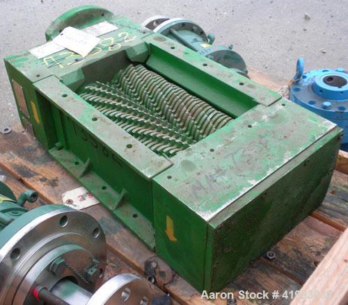 Used JWC Environmental Twin Shaft Open Channel Muffin Monster Shredder, Model 30001-12, Carbon Steel. (2) rows of  4-3/4" diameter intermeshing cutters. Rated approximately 490 gallons per minute. 9’...