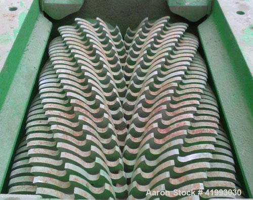 Used JWC Environmental Twin Shaft Open Channel Muffin Monster Shredder, Model 30001-12, Carbon Steel. (2) rows of  4-3/4" diameter intermeshing cutters. Rated approximately 490 gallons per minute. 9’...