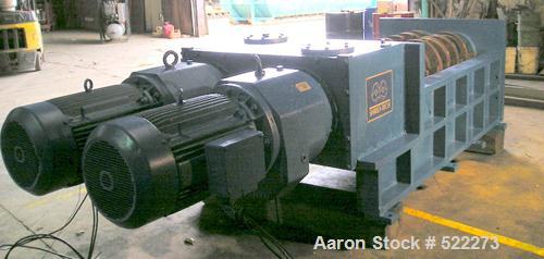 USED: Shred Tech ST100 shredder. Cutting chamber is 62" x 32", dual shaft, slow speed shear type, two 50 hp drives.