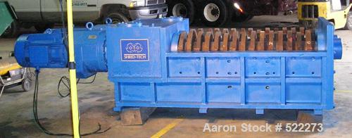 USED: Shred Tech ST100 shredder. Cutting chamber is 62" x 32", dual shaft, slow speed shear type, two 50 hp drives.