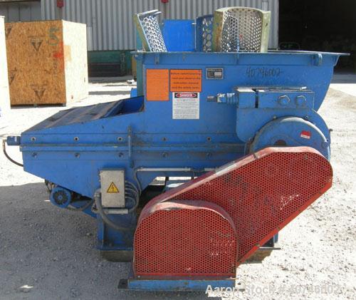 Used Vecoplan single shaft shredder, model VAZ 120/105C, carbon steel. Approximately 8" diameter x 42 1/4" wide rotor with bolt-on cutters. 42 3/16" x 48 7/8" feed opening with 43" tall bolt on hoppe...