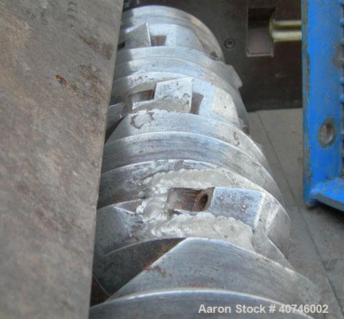 Used Vecoplan single shaft shredder, model VAZ 120/105C, carbon steel. Approximately 8" diameter x 42 1/4" wide rotor with bolt-on cutters. 42 3/16" x 48 7/8" feed opening with 43" tall bolt on hoppe...