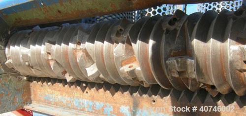 Used Vecoplan single shaft shredder, model VAZ 120/105C, carbon steel. Approximately 8" diameter x 42 1/4" wide rotor with bolt-on cutters. 42 3/16" x 48 7/8" feed opening with 43" tall bolt on hoppe...