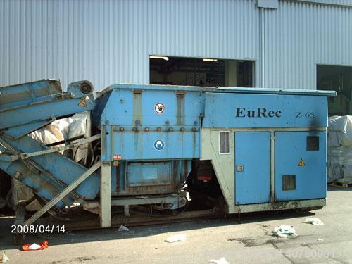 Used Eurec Shredder, model Z65/165. (2) 110 kW (145 hp) motors. Outside dimensions 3400 x 6000 (8700 with open feeder) x 3200. Used for foil shredding. Output 4 t/hour.