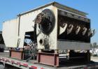 Used Holzmag Single Roll Shredder. Material of construction is carbon steel. 23.4” (600 mm) diameter x 66” (1690 mm) straight side roll with interchangeable knives. Hydraulic ram. Screen with 1.17” x...