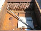 Used Holzmag Single Roll Shredder. Material of construction is carbon steel. 23.4” (600 mm) diameter x 66” (1690 mm) straight side roll with interchangeable knives. Hydraulic ram. Screen with 1.17” x...