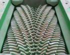 Used JWC Environmental Twin Shaft Open Channel Muffin Monster Shredder, Model 30001-12, Carbon Steel. (2) rows of  4-3/4