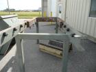 USED: 50 hp SSI shredder, model Q55-ED(40), ram feed. Previously used for medical waste shredding. Low hours.