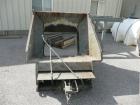 USED: 50 hp SSI shredder, model Q55-ED(40), ram feed. Previously used for medical waste shredding. Low hours.