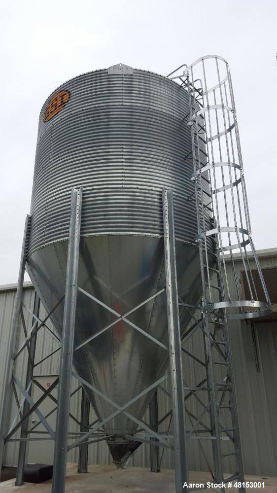 Used GSI Corrugated Silo, Model 12-4-60-16 . 1,706 cubic foot capacity. Galvanized steel. 12' diameter x 25' 10" high. Cone bottom. 60 deg cone. Outside ladder with cage.