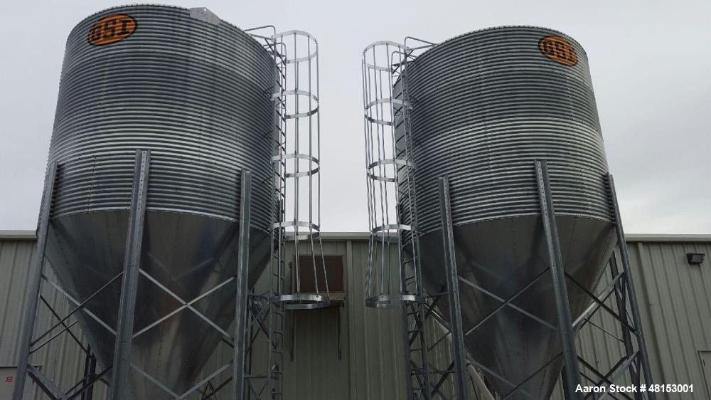 Used GSI Corrugated Silo, Model 12-4-60-16 . 1,706 cubic foot capacity. Galvanized steel. 12' diameter x 25' 10" high. Cone bottom. 60 deg cone. Outside ladder with cage.