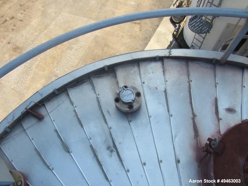 Used Columbian TecTank / Silo, 3,940. 12’ diameter x 55’ high. Carbon Steel. Skirt mounted. Available at extra cost: Pneumatic Conveying system, Pumps, Ladder). Last used for Granulated Sugar.