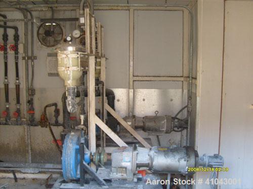 Used Chemco Dry Bulk Storage Silos. System includes 3 silos, 11' diameter x 32' tall each, stair tower and catwalks. Previously used to store and mix lime and powdered activated carbon.