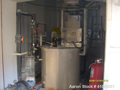 Used Chemco Dry Bulk Storage Silos. System includes 3 silos, 11' diameter x 32' tall each, stair tower and catwalks. Previously used to store and mix lime and powdered activated carbon.