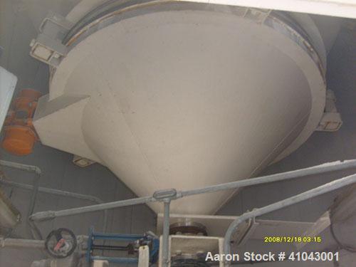 Used Chemco Dry Bulk Storage Silos. System includes 3 silos, 11' diameter x 32' tall each, stair tower and catwalks. Previously used to store and mix lime and powdered activated carbon.