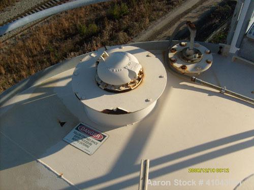 Used Chemco Dry Bulk Storage Silos. System includes 3 silos, 11' diameter x 32' tall each, stair tower and catwalks. Previously used to store and mix lime and powdered activated carbon.