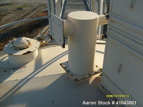 Used Chemco Dry Bulk Storage Silos. System includes 3 silos, 11' diameter x 32' tall each, stair tower and catwalks. Previously used to store and mix lime and powdered activated carbon.