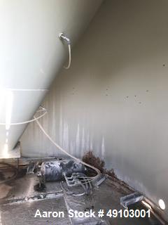 Used Columbia Tec Tank Silo. Approximately 12' diameter x 57' high. 5376 cf tank volume. Approximately 1,000 lbs. Mfg. 2002.