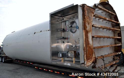 Used APV Crepaco Storage Silo, Size 30K, 30,000 Gallon (4009 Cubic Feet), 316L Stainless Steel, Vertical.  Approximate 136” diameter x 545” overall height. Dished top, sloped bottom. (2) Sections on ...