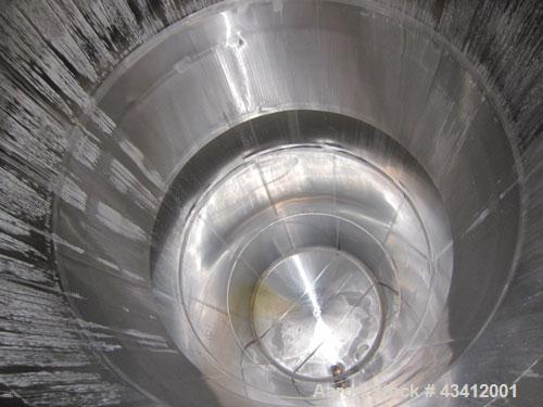 Used APV Crepaco Storage Silo, Size 30K, 30,000 Gallon (4009 Cubic Feet), 316L Stainless Steel, Vertical.  Approximate 136” diameter x 545” overall height. Dished top, sloped bottom. (2) Sections on ...