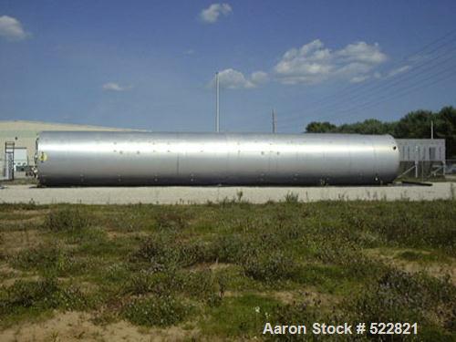 USED: 6,420 cubic foot aluminum storage bin and gravity blender, 12' diameter x 78' high skirt supported. Aluminum construction silo designed with capacity of 35 PCF material. Storage cylinder is app...