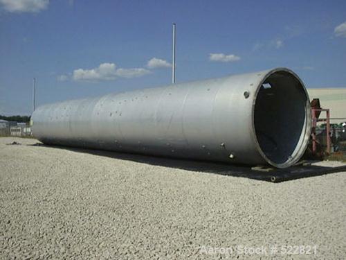 USED: 6,420 cubic foot aluminum storage bin and gravity blender, 12' diameter x 78' high skirt supported. Aluminum construction silo designed with capacity of 35 PCF material. Storage cylinder is app...