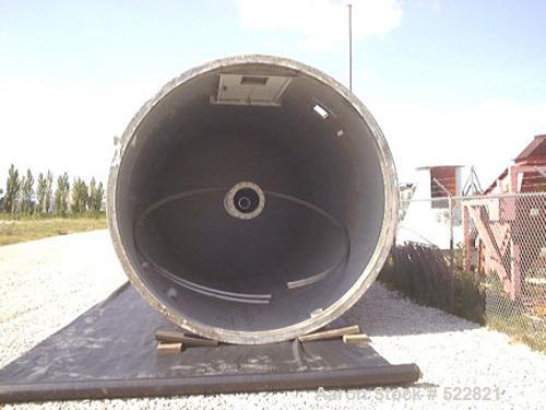 USED: 6,420 cubic foot aluminum storage bin and gravity blender, 12' diameter x 78' high skirt supported. Aluminum construction silo designed with capacity of 35 PCF material. Storage cylinder is app...
