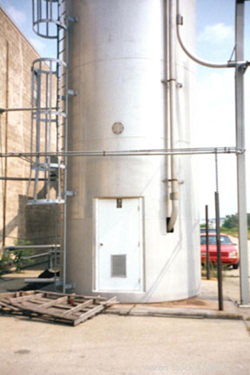USED: 6,420 cubic foot aluminum storage bin and gravity blender, 12' diameter x 78' high skirt supported. Aluminum construction silo designed with capacity of 35 PCF material. Storage cylinder is app...