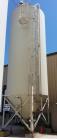 PlasticStor model 1220 silo, 10 deg top, 45 deg cone, includes side ladder. The silo is estimated at 12 diameter by 331