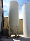PlasticStor model 1220 silo, 10 deg top, 45 deg cone, includes side ladder. The silo is estimated at 12 diameter by 331