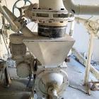 Used (6) Plastic Pellet Silos.