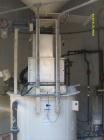 Used Chemco Dry Bulk Storage Silos. System includes 3 silos, 11' diameter x 32' tall each, stair tower and catwalks. Previously used to store and mix lime and powdered activated carbon.