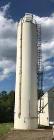 Used Columbia Tec Tank Silo. Approximately 12' diameter x 57' high. 5376 cf tank volume. Approximately 1,000 lbs. Mfg. 2002.