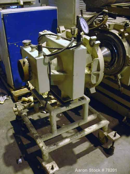 Used Mazzoni High Efficiency Soap Plodder/Extruder, Model M-400. Plodder:  stainless steel contact parts, 22-3/4" wide x 21-1/2" long top feed opening with side feed, breaker assisted. (1) 15" diamet...