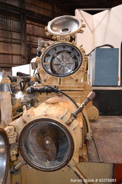 Used Meccaniche Moderne Duplex Vacuum Plodder. 1st Stage is a 10” diameter x 36” long 304 stainless steel refiner screw with feed hopper, approximate 12” long section of carbon steel jacketed barrel....