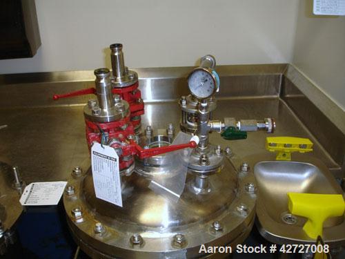 Used Expert Industries Reciever, 30 Gallon, Hastelloy C276. 18" Diameter x 24" straight side, removable dish top, dish bottom, rated 130 psi at 212 F, 3" sight glass, (4) 1.5" top nozzles, 1.5" cente...
