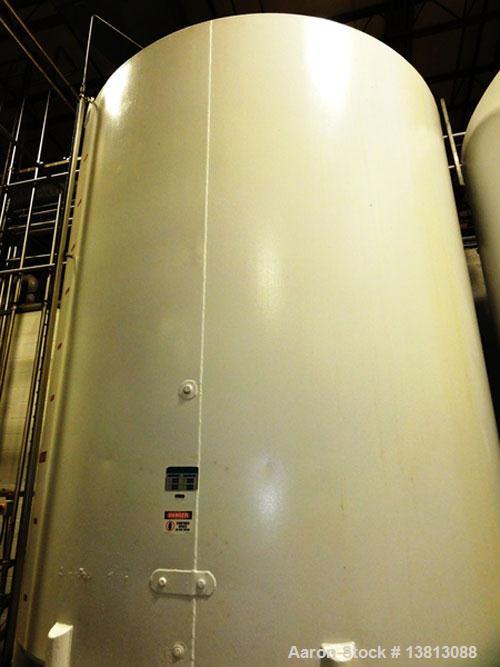 Used-Mueller 5,000 Gallon Top Agitated Tank, R-22 cooling coils, mild steel exterior shell, dish top and dish bottom, bottom...