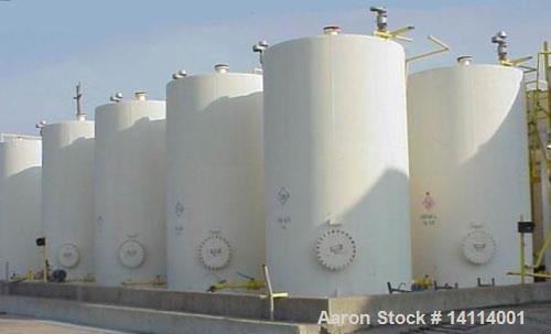 Used 9,840 US Gallon Carbon Steel Tank. Vertical, 10' diameter x 17' high (T-T). 12" dome top. Flat bottom with 3" drain. Top and bottom manway. Overall height 18'6". Top lifting lug.