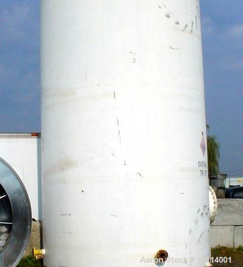 Used 9,840 US Gallon Carbon Steel Tank. Vertical, 10' diameter x 17' high (T-T). 12" dome top. Flat bottom with 3" drain. Top and bottom manway. Overall height 18'6". Top lifting lug.