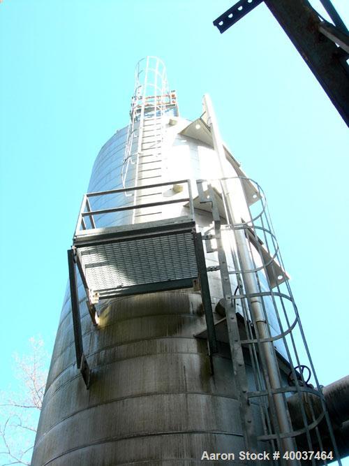 Used: Bloom Welding Tank, 31,980 gallon, Carbon Steel, Vertical. 11'11" diameter x 35' straight side, dished top and bottom. Internal rated 75 psi at 100 deg.f.. Openings top 24",(3)2",(4)4", side 24...