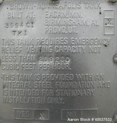 Used Brown-Minneapolis Tank, 4000 gallon, carbon steel, horizontal. Approximately 7' diameter x 14' straight side, flat ends. UL listed for above ground flammable storage. Openings top 2",4",8", 23" ...