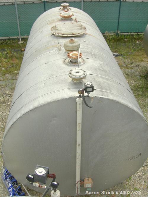 Used Brown-Minneapolis Tank, 4000 gallon, carbon steel, horizontal. Approximately 7' diameter x 14' straight side, flat ends. UL listed for above ground flammable storage. Openings top 2",4",8", 23" ...