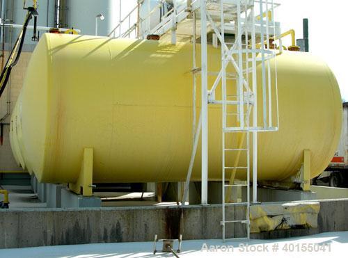 Used:  Carbon steel/rubber lined hydrachloric acid storage tank, approximate 10,000 gallon, horizontal. Approximate 10' diameter x 20' straight side, dished ends, top manway, 4" end bottom outlet. Mo...