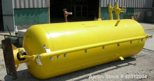 Used Morfab pressure tank, 950 gallon, carbon steel, vertical. Approximately 48" diameter x 120" straight side, dished top and bottom. Internal rated 250 psi at 650 deg F. Pedestal mount.
