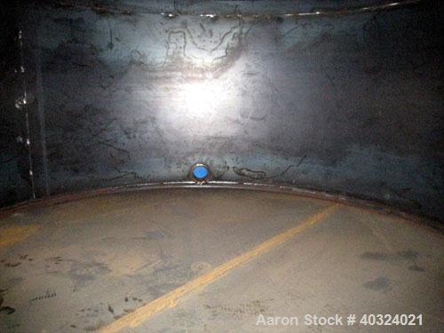 Unused: Highland tank, 16,920 gallon, carbon steel, vertical. Approximately 12' diameter x 20' straight side, slight coned top, flat bottom. U.L. 142 labeled for above ground flammable storage. Openi...
