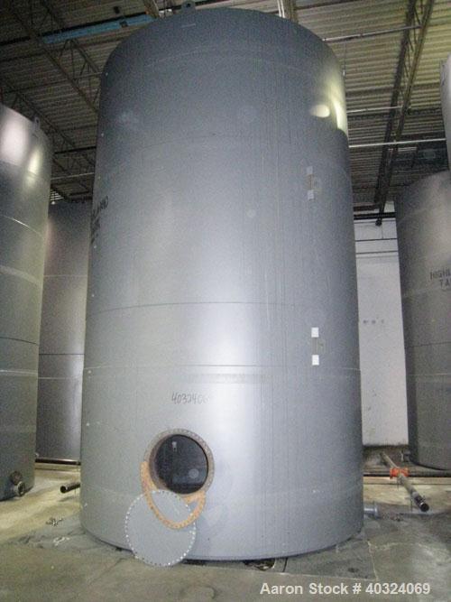Unused: Highland tank, 16,920 gallon, carbon steel, vertical. Approximately 12' diameter x 20' straight side, slight coned top, flat bottom. U.L. 142 labeled for above ground flammable storage. Openi...