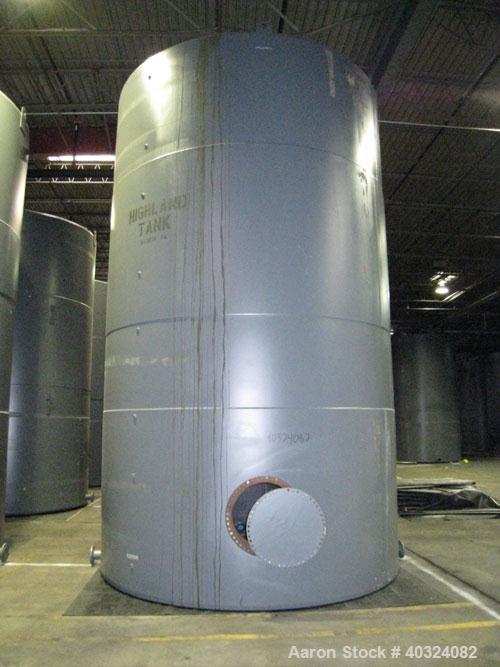 Unused: Highland tank, 16,920 gallon, carbon steel, vertical. Approximately 12' diameter x 20' straight side, slight coned top, flat bottom. U.L. 142 labeled for above ground flammable storage. Openi...