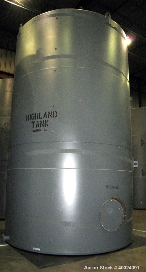 Unused: Highland tank, 14,382 gallon, carbon steel, vertical. Approximately 12' diameter x 17' straight side, slight coned top, flat bottom. U.L. 142 labeled for above ground flammable storage. Openi...