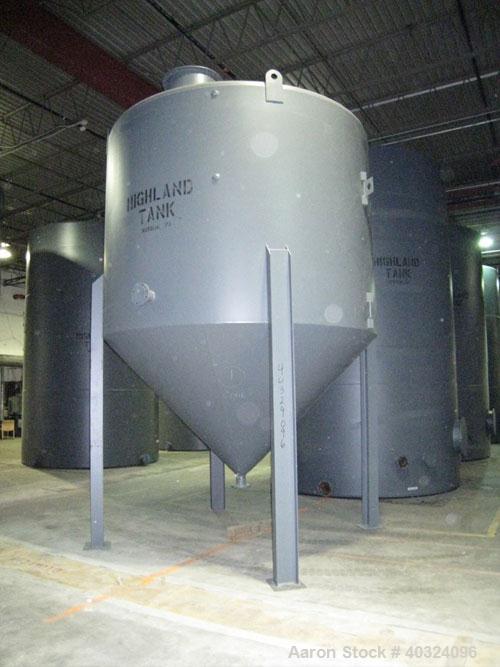 Unused: Highland tank, 6,000 gallon, carbon steel, vertical. Approximately 11' diameter x 8' straight side. Dished top, coned bottom. Openings: top 4", and a manway; side 4"; 4" center bottom outlet....
